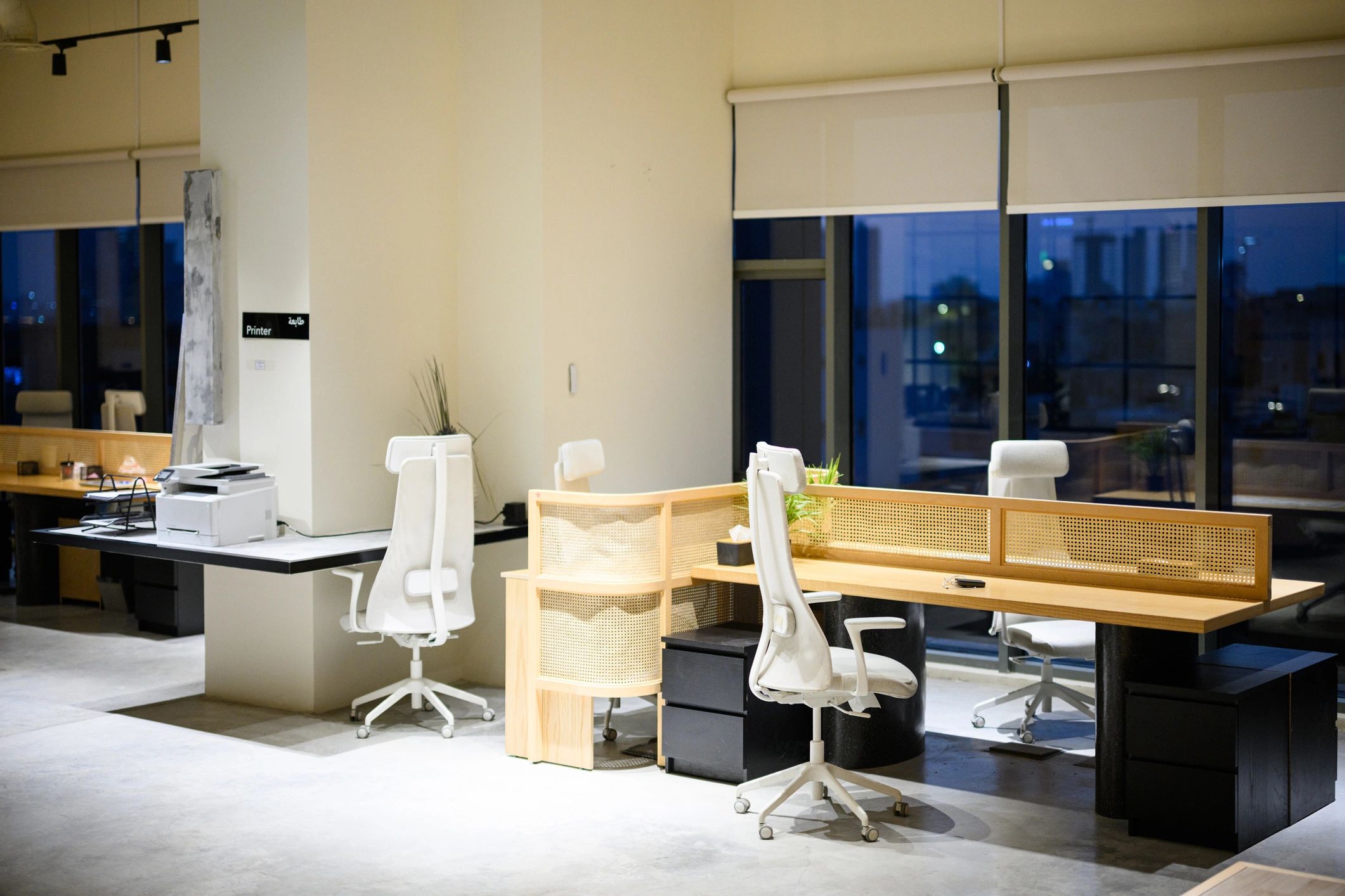 Modern coworking office interior with desks and chairs