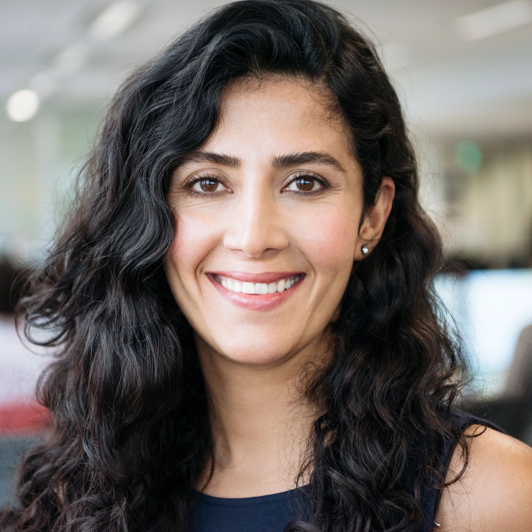 Portrait of Maya Patel, Community Manager